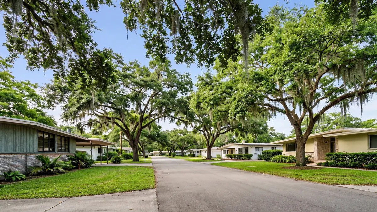 Mid-century homes along an oak-lined street in Boulevard Heights, Hollywood FL